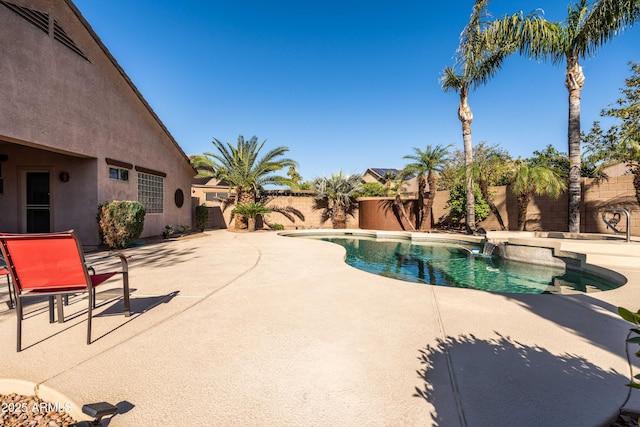 view of pool featuring a fenced backyard and a patio