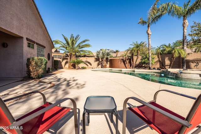 view of swimming pool featuring a fenced in pool, a patio area, and a fenced backyard