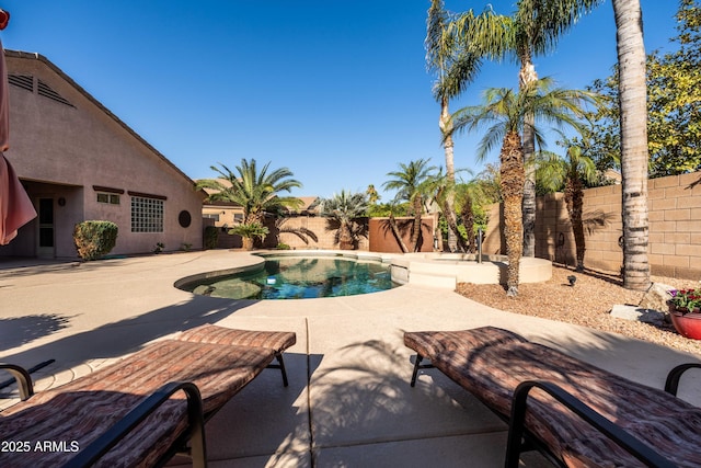 view of swimming pool with a patio area, a fenced backyard, and a fenced in pool