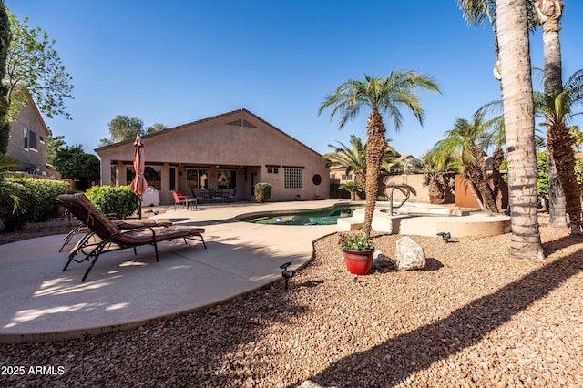 view of swimming pool with a patio area, a fenced backyard, and a fenced in pool