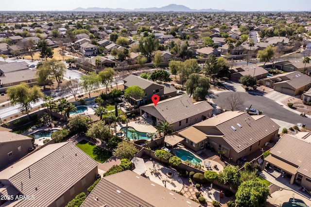 birds eye view of property with a residential view