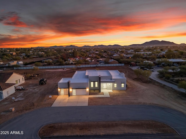 475 W Saddle Mountain Rd, Phoenix, AZ 85086 - view of front of home with concrete driveway, a mountain view, a garage, and stucco siding