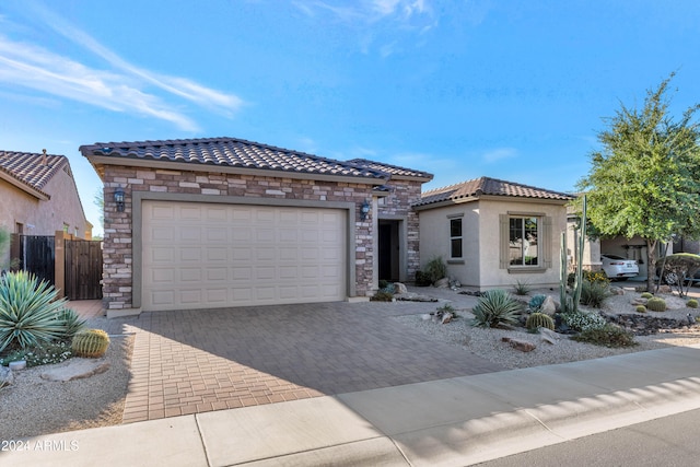 view of front of property featuring a garage