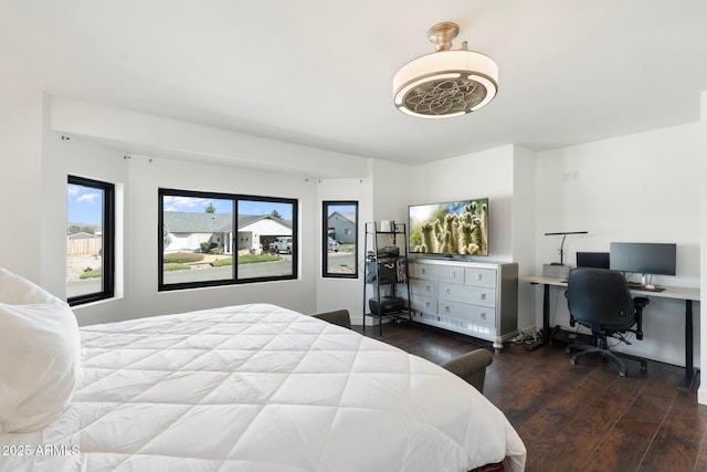 bedroom with wood finished floors