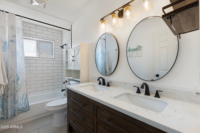 full bathroom featuring double vanity, shower / tub combo, toilet, and a sink