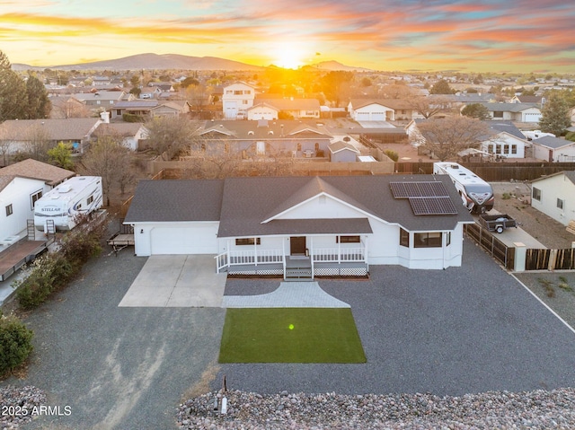bird's eye view with a residential view and a mountain view