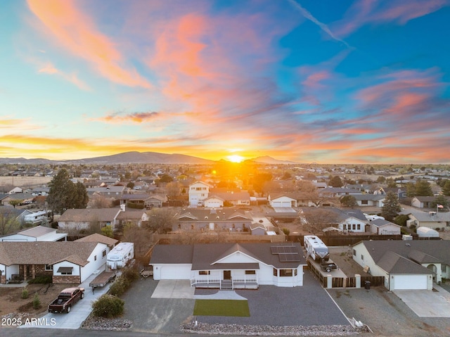 aerial view featuring a residential view and a mountain view