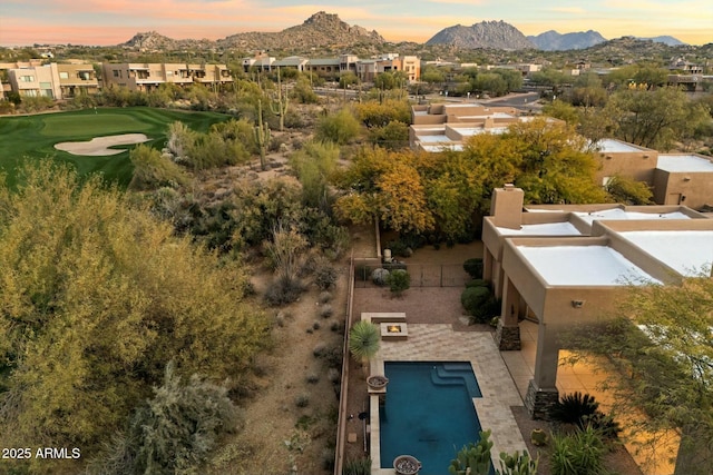 aerial view at dusk with a mountain view