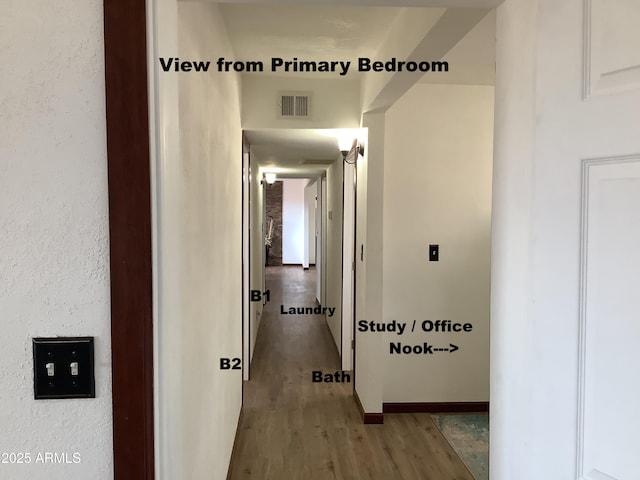 3607 E Mule Deer Rd, Pearce, AZ 85625 - hallway with wood finished floors