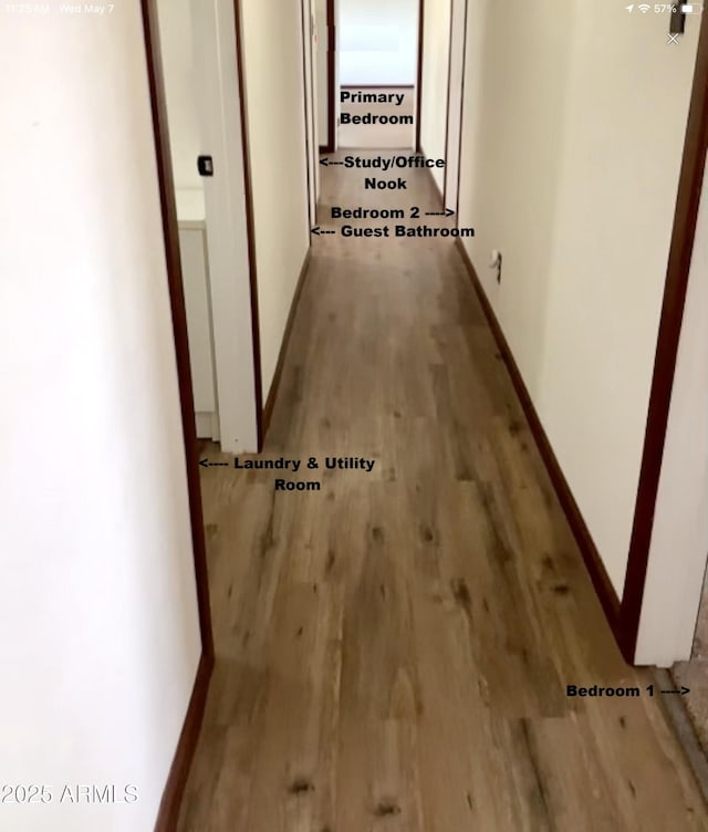 3607 E Mule Deer Rd, Pearce, AZ 85625 - corridor featuring wood finished floors and baseboards
