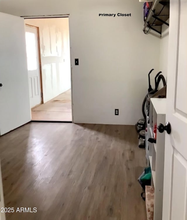 3607 E Mule Deer Rd, Pearce, AZ 85625 - laundry area with wood finished floors