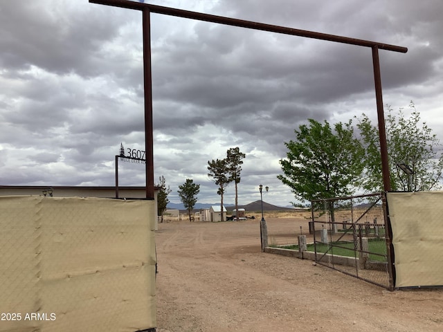 3607 E Mule Deer Rd, Pearce, AZ 85625 - view of dirt / gravel road featuring a gated entry
