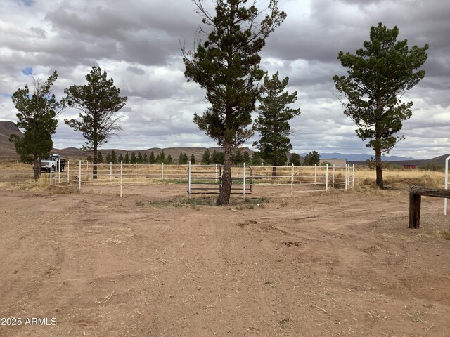 3607 E Mule Deer Rd, Pearce, AZ 85625 - view of yard featuring a view of countryside and fence