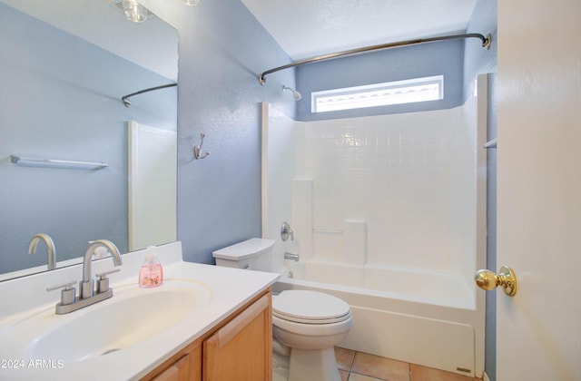 full bathroom featuring a textured wall, toilet, tile patterned flooring, vanity, and shower / bathing tub combination