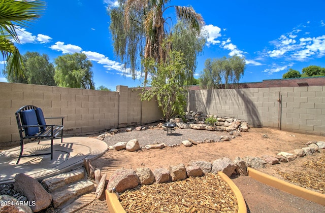 view of yard with a fenced backyard