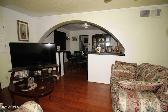 1211 E Fillmore St, Phoenix, AZ 85006 - living room featuring wood finished floors and arched walkways