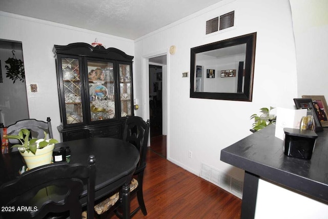 1211 E Fillmore St, Phoenix, AZ 85006 - dining space with wood finished floors and ornamental molding