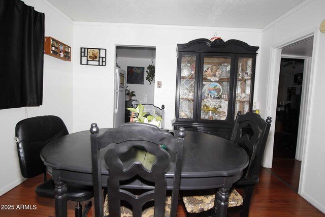 1211 E Fillmore St, Phoenix, AZ 85006 - dining space featuring wood finished floors and ornamental molding