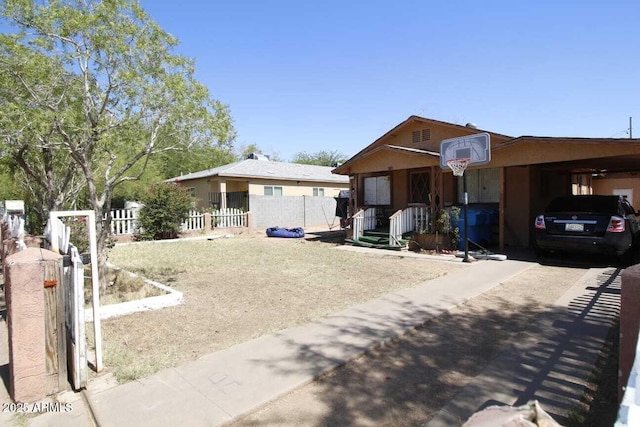 1211 E Fillmore St, Phoenix, AZ 85006 - view of front facade featuring a carport and driveway