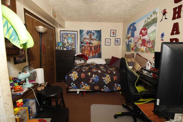 1211 E Fillmore St, Phoenix, AZ 85006 - bedroom with a textured ceiling, a desk, and carpet