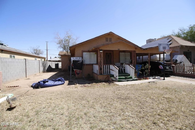 1211 E Fillmore St, Phoenix, AZ 85006 - view of front facade with a porch and stucco siding