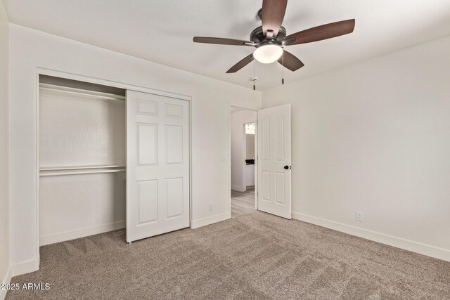 19006 E Karsten Dr, Queen Creek, AZ 85142 - unfurnished bedroom featuring carpet floors, a closet, baseboards, and ceiling fan