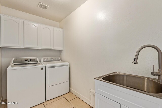 19006 E Karsten Dr, Queen Creek, AZ 85142 - laundry area featuring cabinet space, washer and clothes dryer, light tile patterned flooring, and baseboards