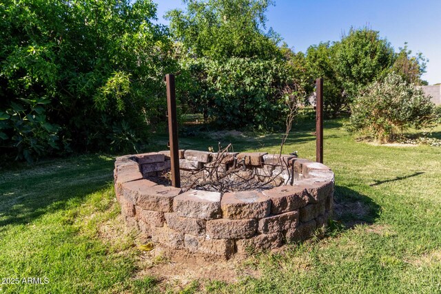 19006 E Karsten Dr, Queen Creek, AZ 85142 - view of grassy yard with an outdoor fire pit