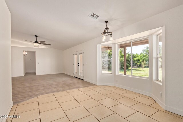 19006 E Karsten Dr, Queen Creek, AZ 85142 - spare room with a chandelier, light wood-type flooring, ceiling fan, and baseboards