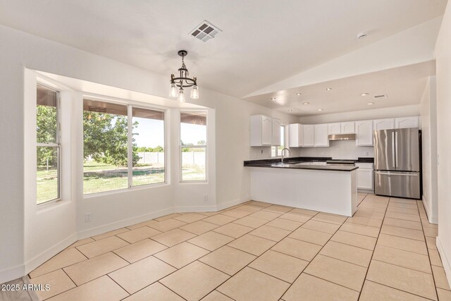 19006 E Karsten Dr, Queen Creek, AZ 85142 - kitchen featuring freestanding refrigerator, a chandelier, a sink, dark countertops, and light tile patterned floors