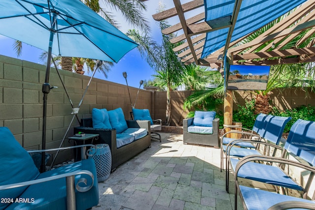 view of patio with a pergola and an outdoor hangout area