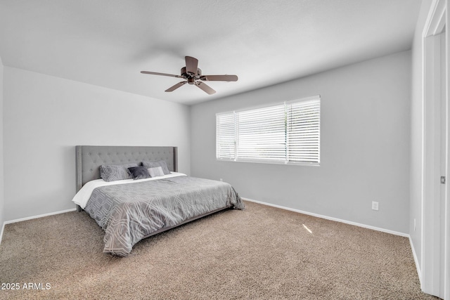 14521 W Gelding Dr, Surprise, AZ 85379 - bedroom featuring baseboards, ceiling fan, and carpet floors