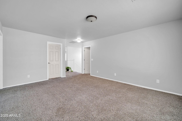 14521 W Gelding Dr, Surprise, AZ 85379 - unfurnished room with baseboards, visible vents, and carpet flooring