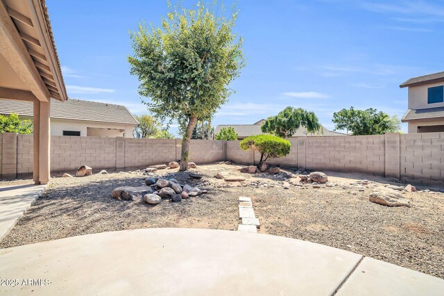 14521 W Gelding Dr, Surprise, AZ 85379 - view of yard with a fenced backyard and a patio area
