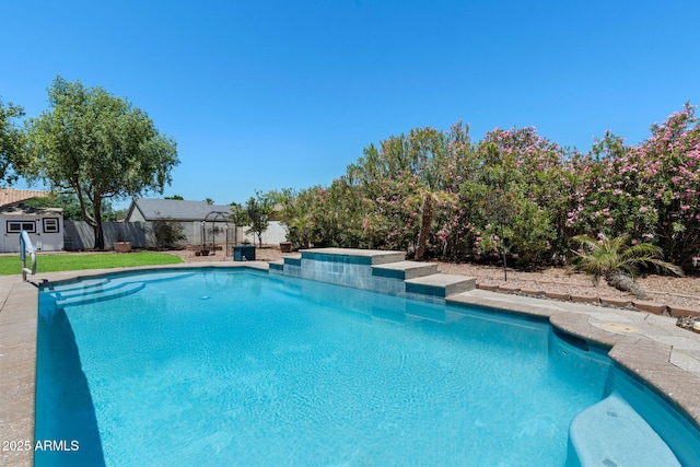 3822 E Florian Ave, Mesa, AZ 85206 - view of pool with a shed, an outdoor structure, and a fenced backyard