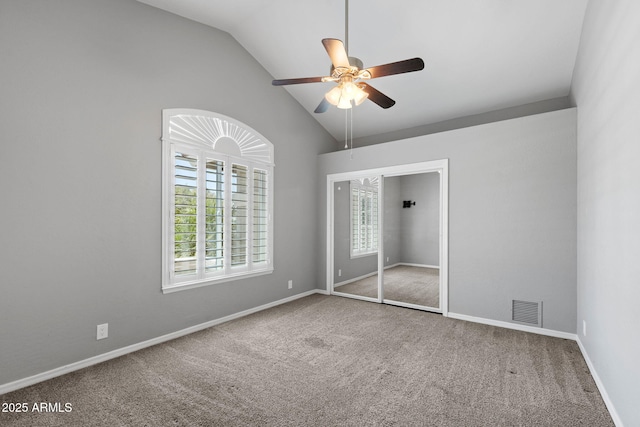 3822 E Florian Ave, Mesa, AZ 85206 - unfurnished bedroom featuring carpet, vaulted ceiling, baseboards, a closet, and ceiling fan