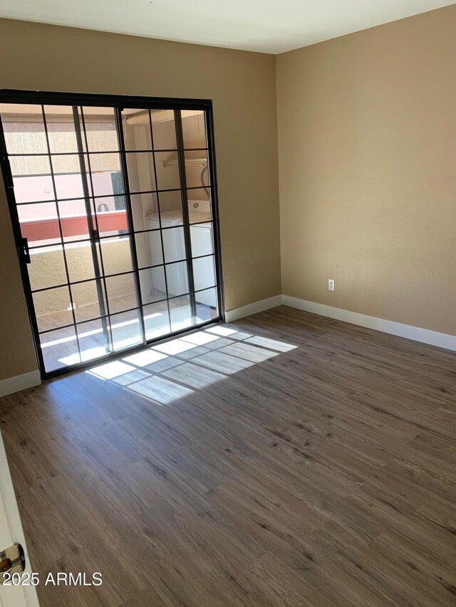 3131 W Cochise Dr Unit 218, Phoenix, AZ 85051 - unfurnished room with wood finished floors and baseboards