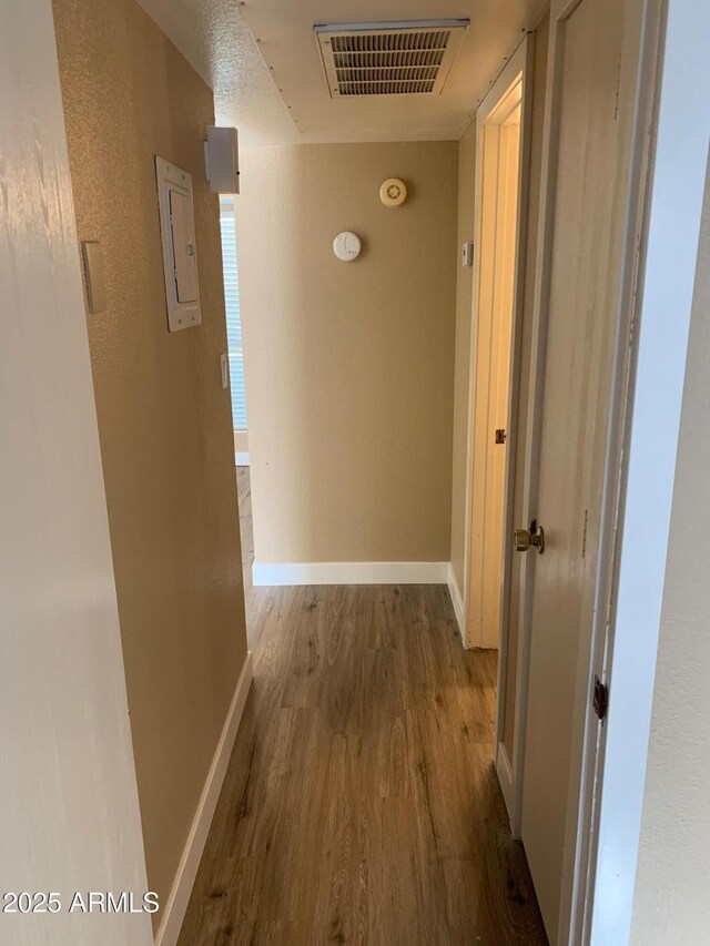 3131 W Cochise Dr Unit 218, Phoenix, AZ 85051 - corridor featuring baseboards, wood finished floors, and visible vents