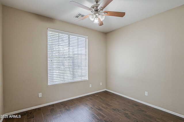 5926 W Questa Dr, Glendale, AZ 85310 - empty room with baseboards, visible vents, ceiling fan, and dark wood-type flooring