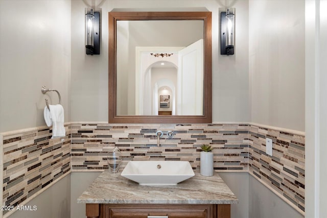 8599 E Sand Flower Dr, Scottsdale, AZ 85266 - bathroom featuring vanity and tile walls