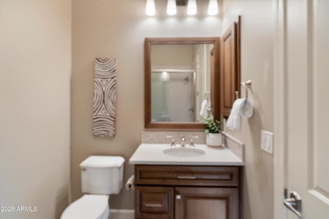 8599 E Sand Flower Dr, Scottsdale, AZ 85266 - bathroom with toilet, vanity, and baseboards