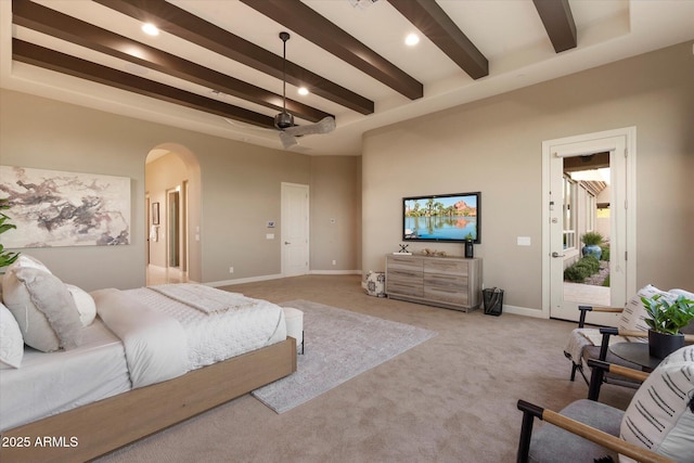 8599 E Sand Flower Dr, Scottsdale, AZ 85266 - bedroom with arched walkways, beam ceiling, recessed lighting, light colored carpet, and access to outside