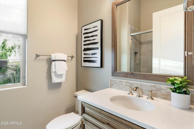 8599 E Sand Flower Dr, Scottsdale, AZ 85266 - full bath with toilet, tasteful backsplash, vanity, and tiled shower