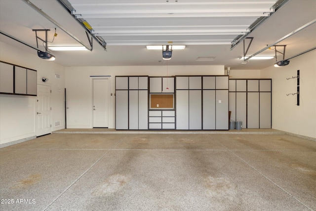 8599 E Sand Flower Dr, Scottsdale, AZ 85266 - garage featuring a garage door opener