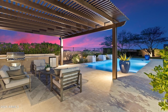 8599 E Sand Flower Dr, Scottsdale, AZ 85266 - pool at dusk featuring a pergola, a fenced backyard, a grill, a fenced in pool, and exterior kitchen