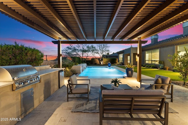 8599 E Sand Flower Dr, Scottsdale, AZ 85266 - pool with outdoor lounge area, exterior kitchen, area for grilling, a fenced backyard, and a patio area