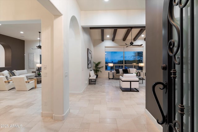8599 E Sand Flower Dr, Scottsdale, AZ 85266 - entrance foyer with baseboards, arched walkways, a ceiling fan, and recessed lighting