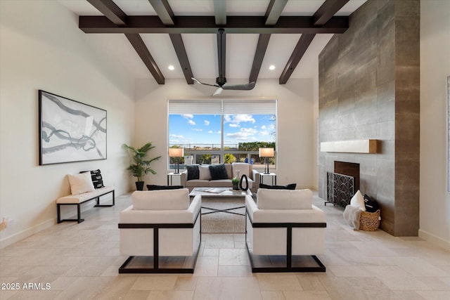 8599 E Sand Flower Dr, Scottsdale, AZ 85266 - living area featuring a fireplace, baseboards, beamed ceiling, and recessed lighting