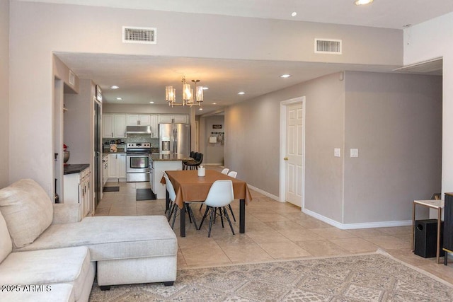 dining room with recessed lighting, visible vents, an inviting chandelier, and light tile patterned floors