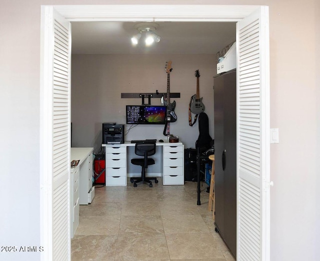 office space featuring light tile patterned floors